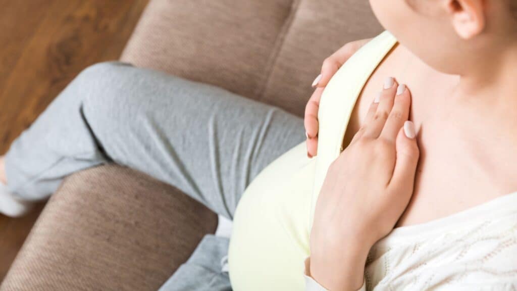pregnant woman with sore breasts