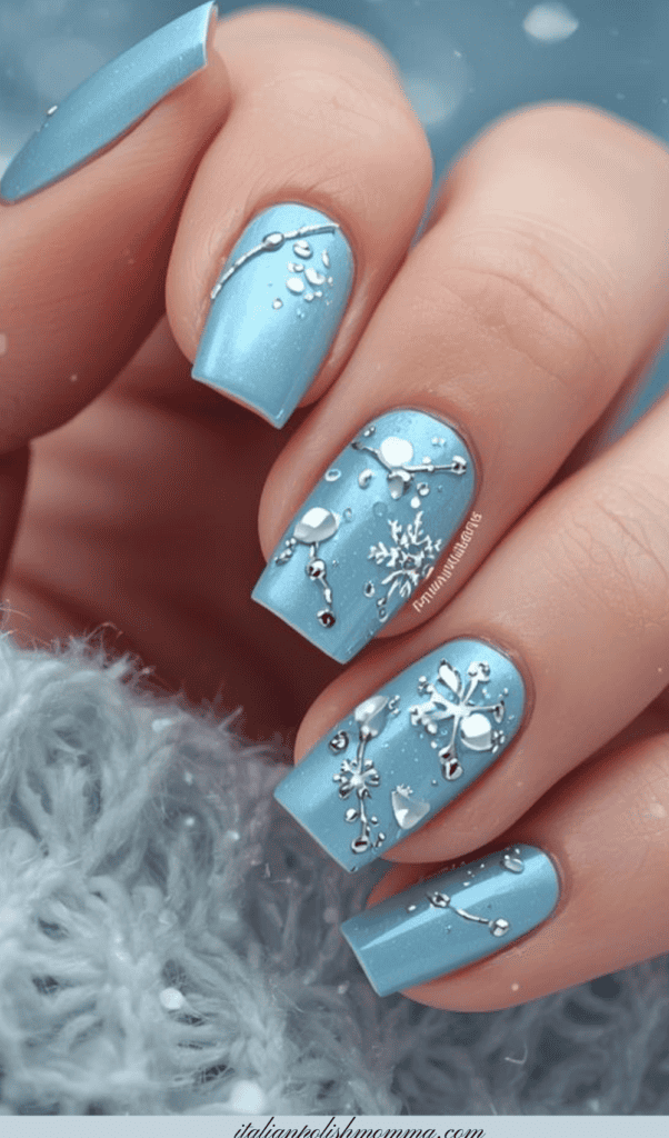 Icy blue winter snowflake nails