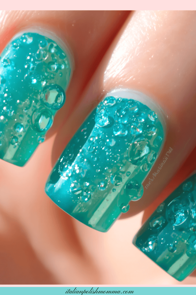 Teal glass water droplet nails for summer